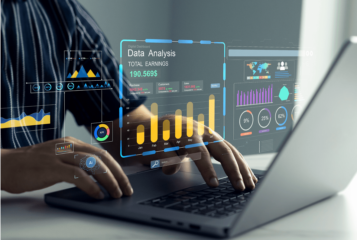 Person analyzing data on a laptop screen.